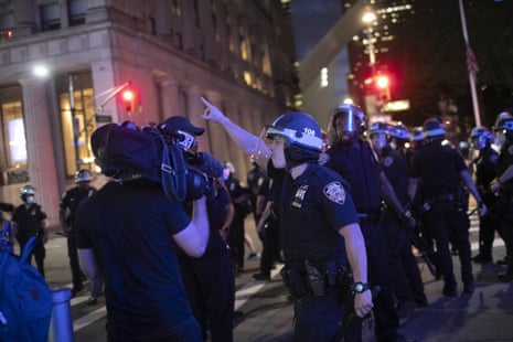 A police officer shouts at the Associated Press videojournalist Robert Bumsted last week in New York.