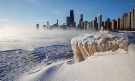 Polar vortex to bring sub-zero temperatures<br>epa07331746 Steam rises from the city and Lake Michigan as the sun comes up in Chicago, Illinois USA, 30 January 2019. The US Midwest is braced with a coldspell as a polar vortex sent temperatures far below zero degrees Celsius. According to meteorologists temperatures in Chicago area could drop to minus 31 degress Celsius (-25F). EPA/KAMIL KRZACZYNSKI