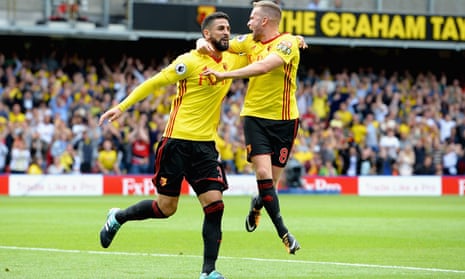 Miguel Britos celebrates scoring Watford’s third with Tom Cleverely against Liverpool.