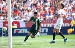 Wu Lei celebrates after scoring for Espanyol against Sevilla.