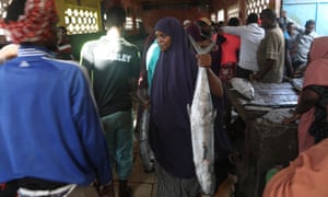 Fardowsa Mohamed Ahmed sells fish at a fish market in Mogadishu, Somalia