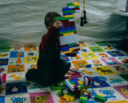 Danylo playing with plastic bricks