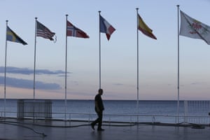 A security guard walks near the scene of the attack