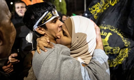 PALESTINIAN-ISRAEL-CONFLICTA Palestinian prisoner reacts after being released from an Israeli jail in exchange for Israeli hostages released by Hamas from the Gaza Strip,, in the occupied West Bank on November 28, 2023. Israel's prison authority said that 33 Palestinian prisoners had been released "during the night" under the terms of a truce deal that returned hostages from the Gaza Strip. (Photo by FADEL SENNA / AFP) (Photo by FADEL SENNA/AFP via Getty Images)