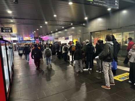 Peak-hour commuters queueing at Melbourne’s Southern Cross station on 8 July after delays to V-Line services caused by a Telstra outage