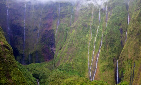 Waialeale crater with many waterfalls and green cliffs in Kauai, Hawaii, USA.