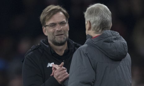 Jurgen Klopp and Arsenal’s Arsene Wenger shake hands after the 3-3 draw in London.