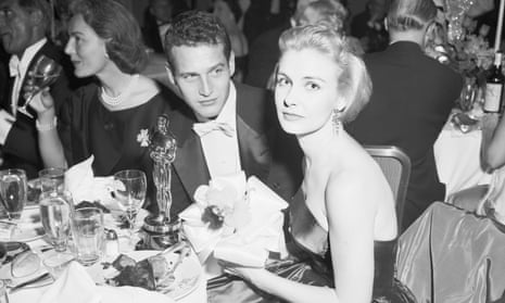 Joanne Woodward and Paul Newman at the Oscars in 1958, where Woodward was named best actress for her role in The Three Faces of Eve.