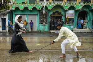 Kolkata: A Muslim girl participates in a mock fight during a Muharram procession