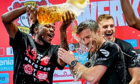 Xabi Alonso endures a victory drenching after helping to end Leverkusen’s long wait for Bundesliga glory.