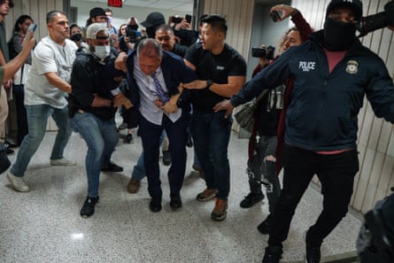 Brad Lander is placed under arrest by federal agents outside immigration court in New York on 17 June.