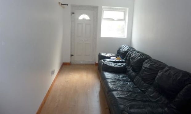 A sofa inside the garage flat