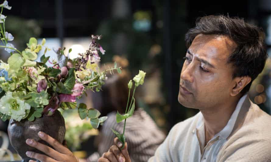 Building with flowers… 'I whisper the names as I insert the flowers into place, the scent coiling in my nose.'