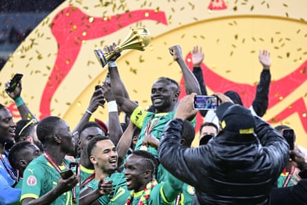 Sadio Mané holds the Africa Cup of Nations trophy