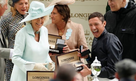 Camilla, the Duchess of Cornwall presents Frankie Dettori with an award after he won the Prince Of Wales’s Stakes on Crystal Ocean.