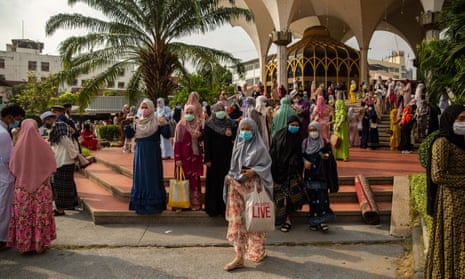 Thai Muslims celebrate Eid al-Fitr at The Foundation of the Islamic Centre of Thailand to mark the end of the holy month of Ramadan on 24 May 2020 in Bangkok, Thailand.