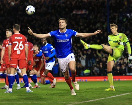 Portsmouth defender Conor Shaughnessy celebrates his opening goal.
