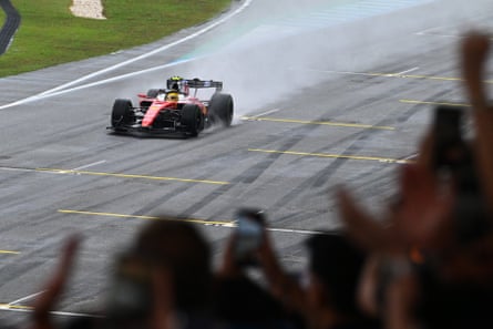 Lewis Hamilton battled back to earn a podium finish in the wet weather at the Sepang Circuit.