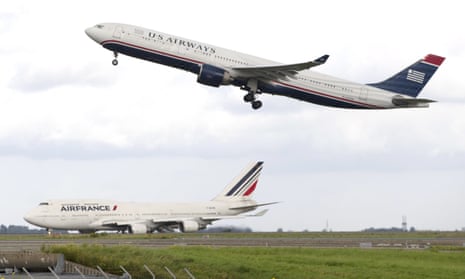 A US Airways plane takes off at the Roissy-Charles-de-Gaulle airport in France.