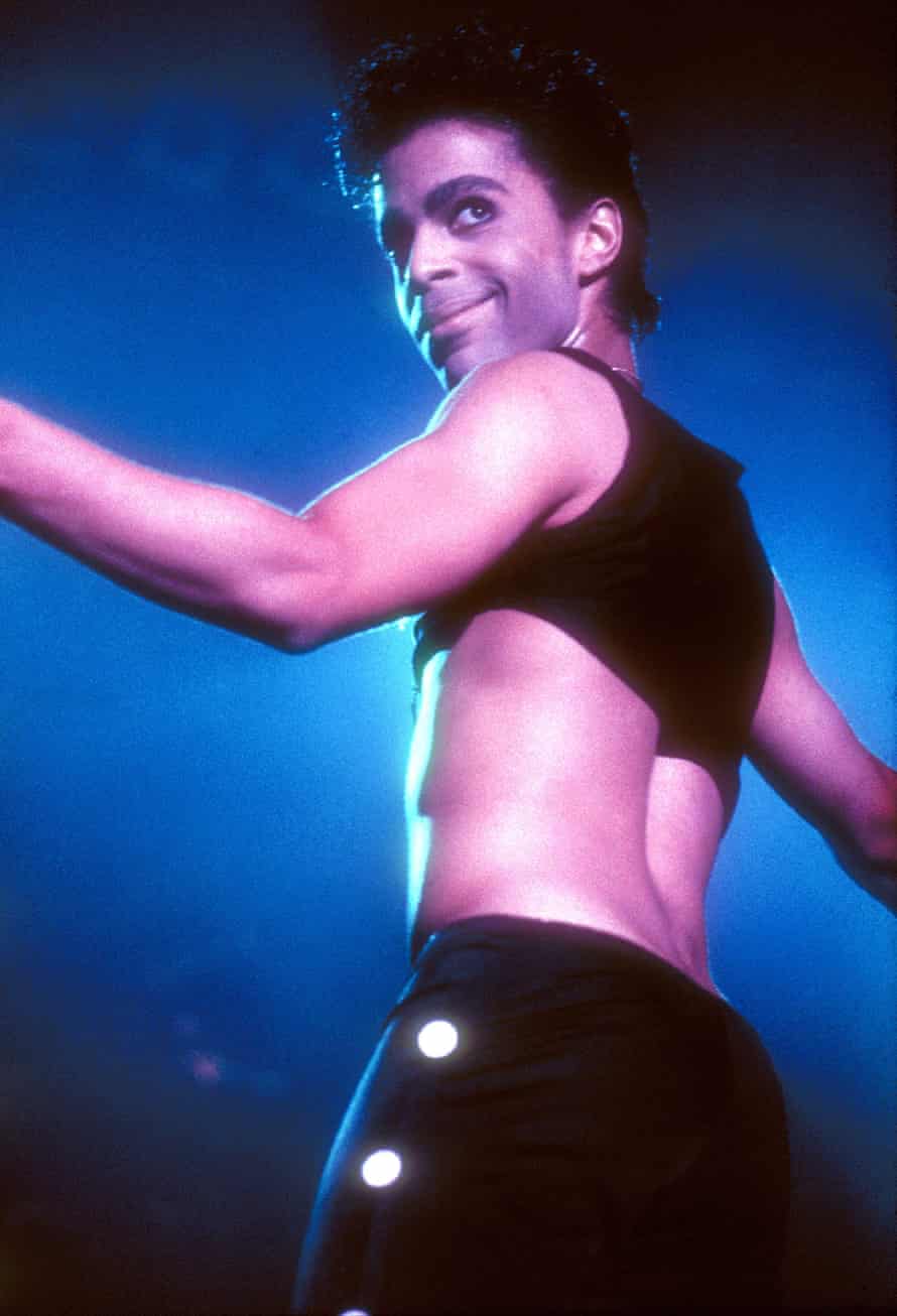 Prince on tour in 1986 in a crop top.