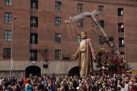 A huge puppet named Giant walks past the dockside in Royal de Luxe’s production Liverpool’s Dream.