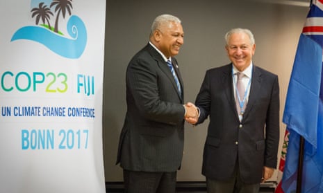 Frank Bainimarama, prime minister of Fiji and host of the Bonn talks, meets with Ambassador Aziz Mekouar of Morrocco