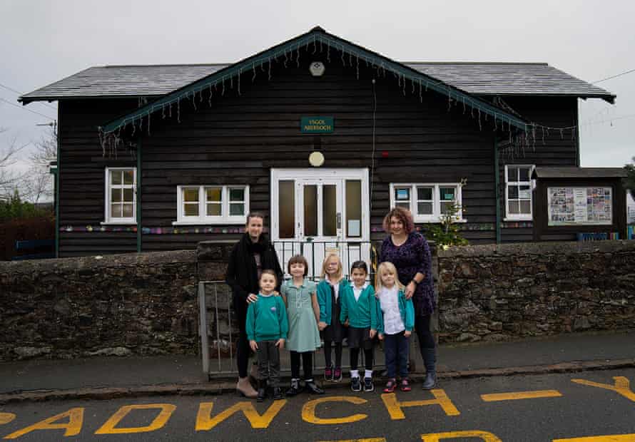 Ysgol Abersoch teacher Natalie Williams (left) and headteacher Linda Jones with pupils Maisie and Charlotte, 6; Vera, 7, Melissa 5 and Mansar