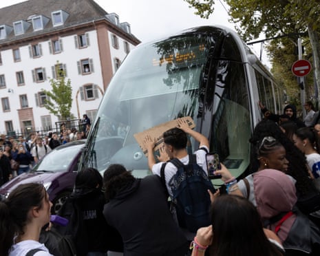 High school students take part in a protest and block access to their school in Strasbourg, France.
