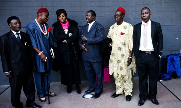 Environmental lawyer Chima Williams with Nigerian farmers at the law courts in The Hague in October 2012.