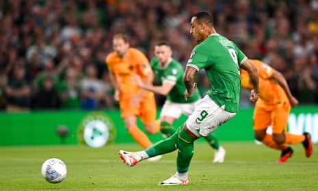 Adam Idah of Republic of Ireland shoots to score his side's first goal from a penalty.