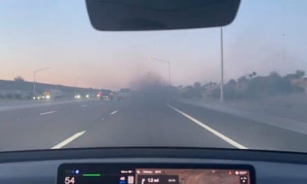 A video from a Tesla Model 3 driver showing the fumes from three trucks in Phoenix, Arizona.