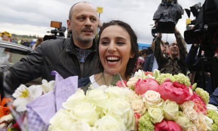Jamala with bunches flowers