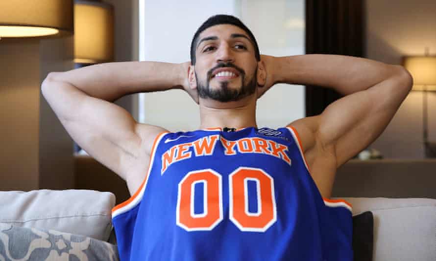 Enes Kanter watches his team, the New York Knicks, play the Washington Wizards from his sofa in the US.
