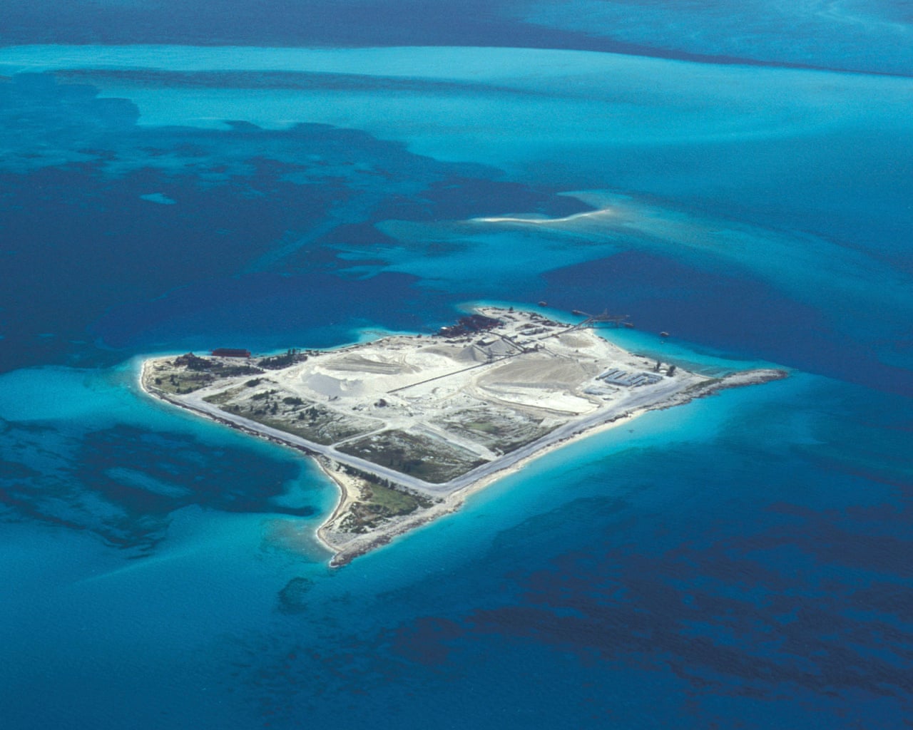 Aerial view of Bimini Islands, a small sandy island surrounded by turquoise Bahamian waters