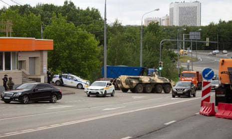 Police and the military check vehicles going in and out of the city in the Yasenevo district in southern Moscow on Saturday, June 24 2023
