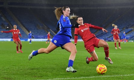 Leicester’s Ruby Mace tries to evade the incoming challenge from Liverpool’s Gemma Evans