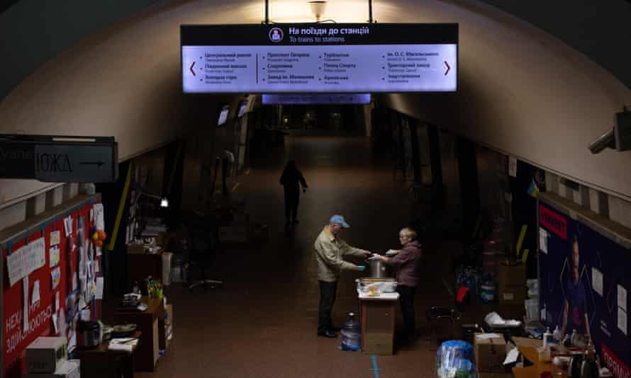 Russia-Ukraine war: Moscow attacks UK’s ‘anti-Russian hysteria’; Zelenskiy and Johnson discuss Mariupol situation – live | Russia 3 A man receives food inside a subway station used as a bomb shelter, as Russia’s attack on Ukraine continues, in Kharkiv, northeast Ukraine.