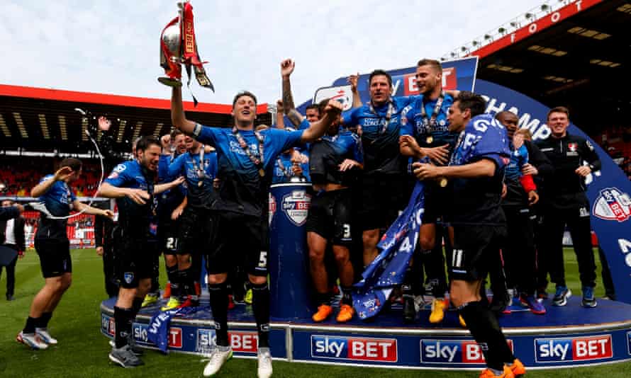 Tommy Elphick of Bournemouth lifts the Championship trophy, won under Eddie Howe in May 2015.