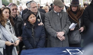 Family members and friends gather at the funeral of Mireille Knoll, who was stabbed to death in her home