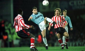 Kinkladze looks to escape the attentions of Barry Venison and Mark Walters.