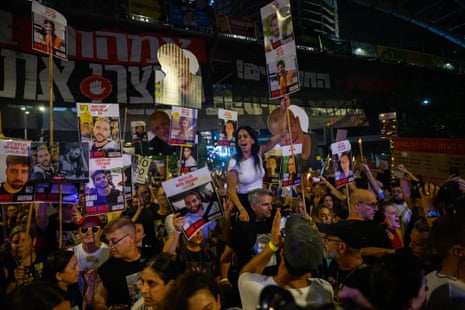 Families of hostages lead a march around the Kirya complex in Tel Aviv during an anti-government protest and rally against an expansion to the war on Gaza.