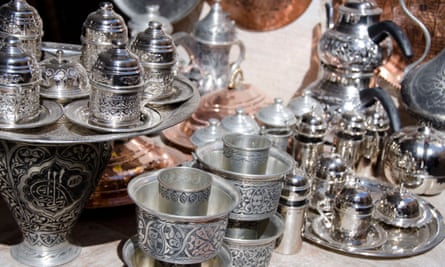 Mardin, Turkey is an area famous for its Syrian Orthodox silver. In this close-up image is a range of silverware, including teapots and teacups.