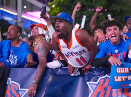 Knicks fans celebrate during a watch party in New York City.