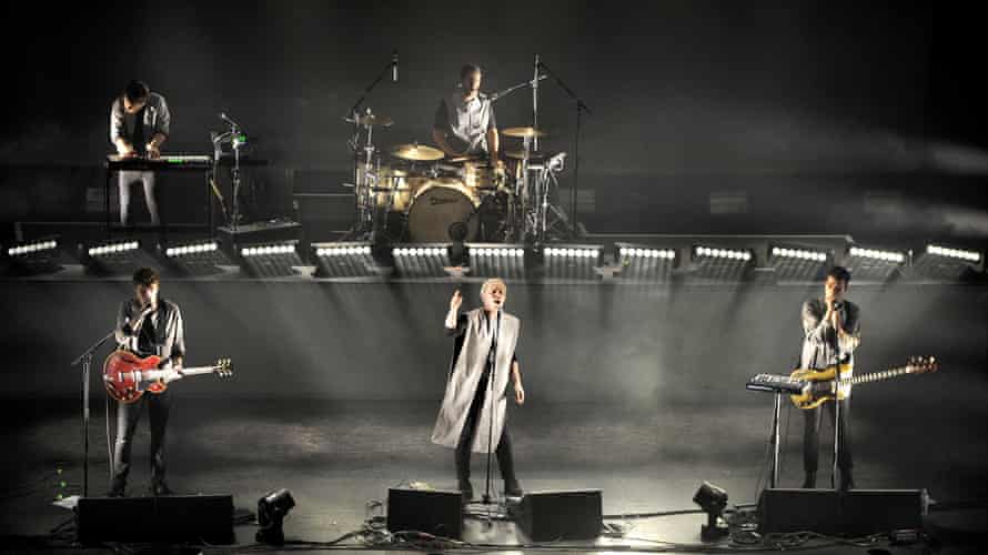 Everything Everything on stage in 2015.