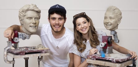 With Sugg and their Madame Tussauds wax heads.