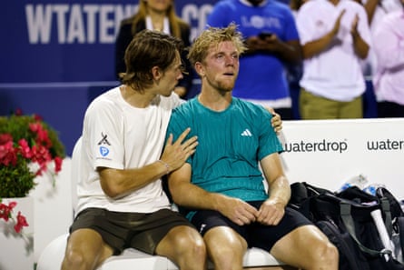 De Minaur consoles Davidovich Fokina after the match.