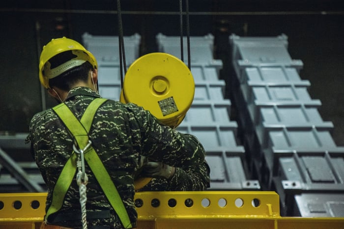 A Taiwan navy soldier rehearses a missile loading operation at an undisclosed location in this image released on 7 August.