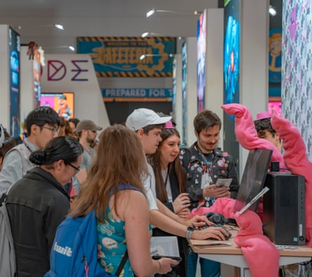 Crowds compete to demo Middle Management, a satirical game about office culture developed in New Zealand.