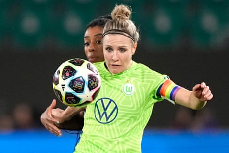 Ashley Lawrence challenges for the ball with Wolfsburg's Svenja Huth.