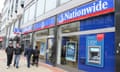 Nationwide building society on a high street with pedestrians walking past